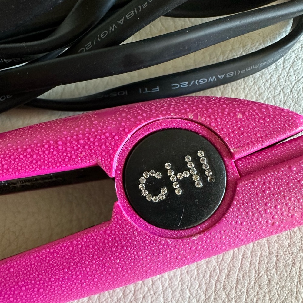 SALE.  CHI Ceramic Titanium Hairstyling  Iron 1 inches.Used ,very good Condition